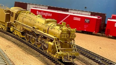 Brass Steam Passing Burlington Boxcar